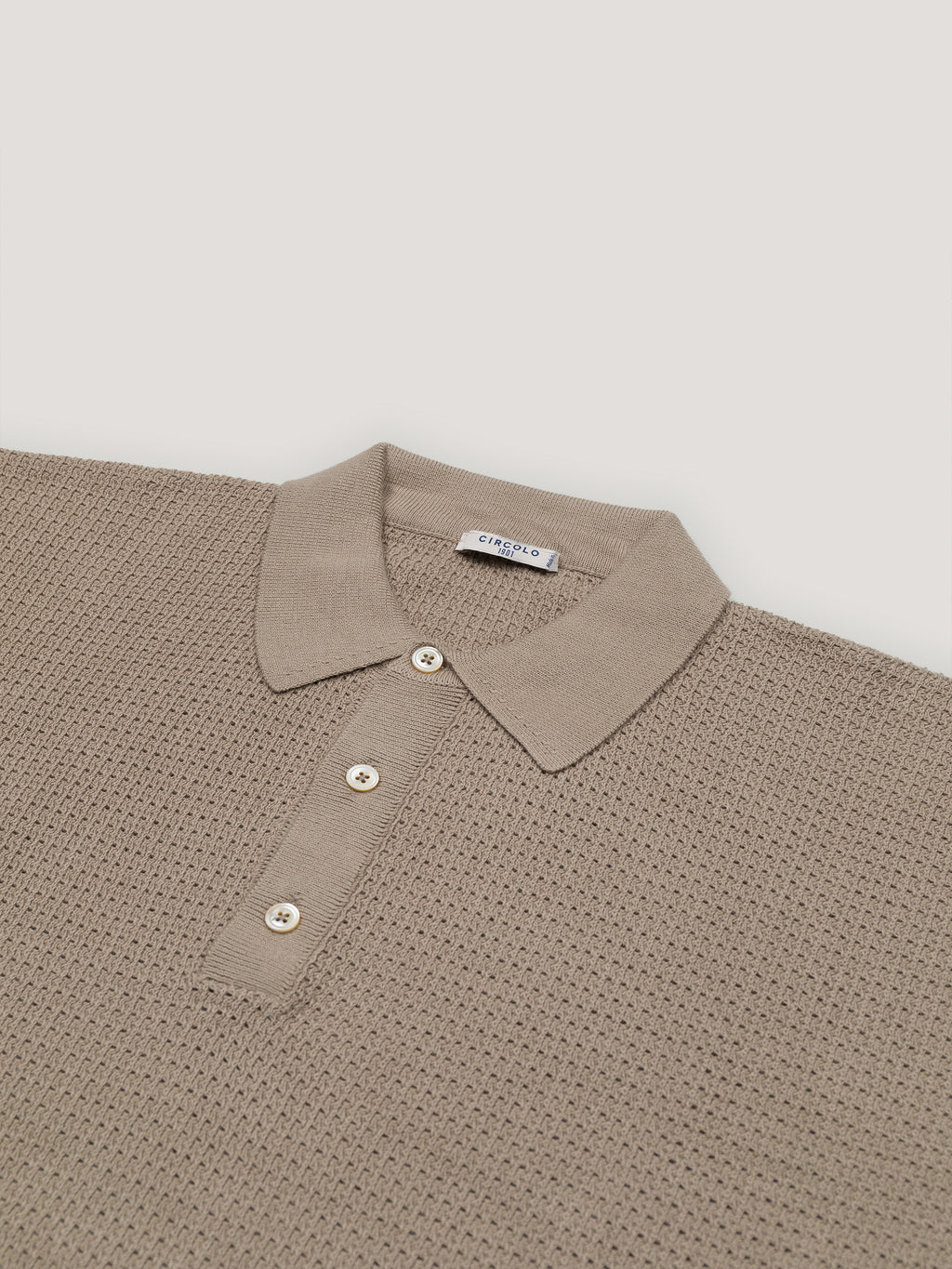 Eyelet pattern polo shirt