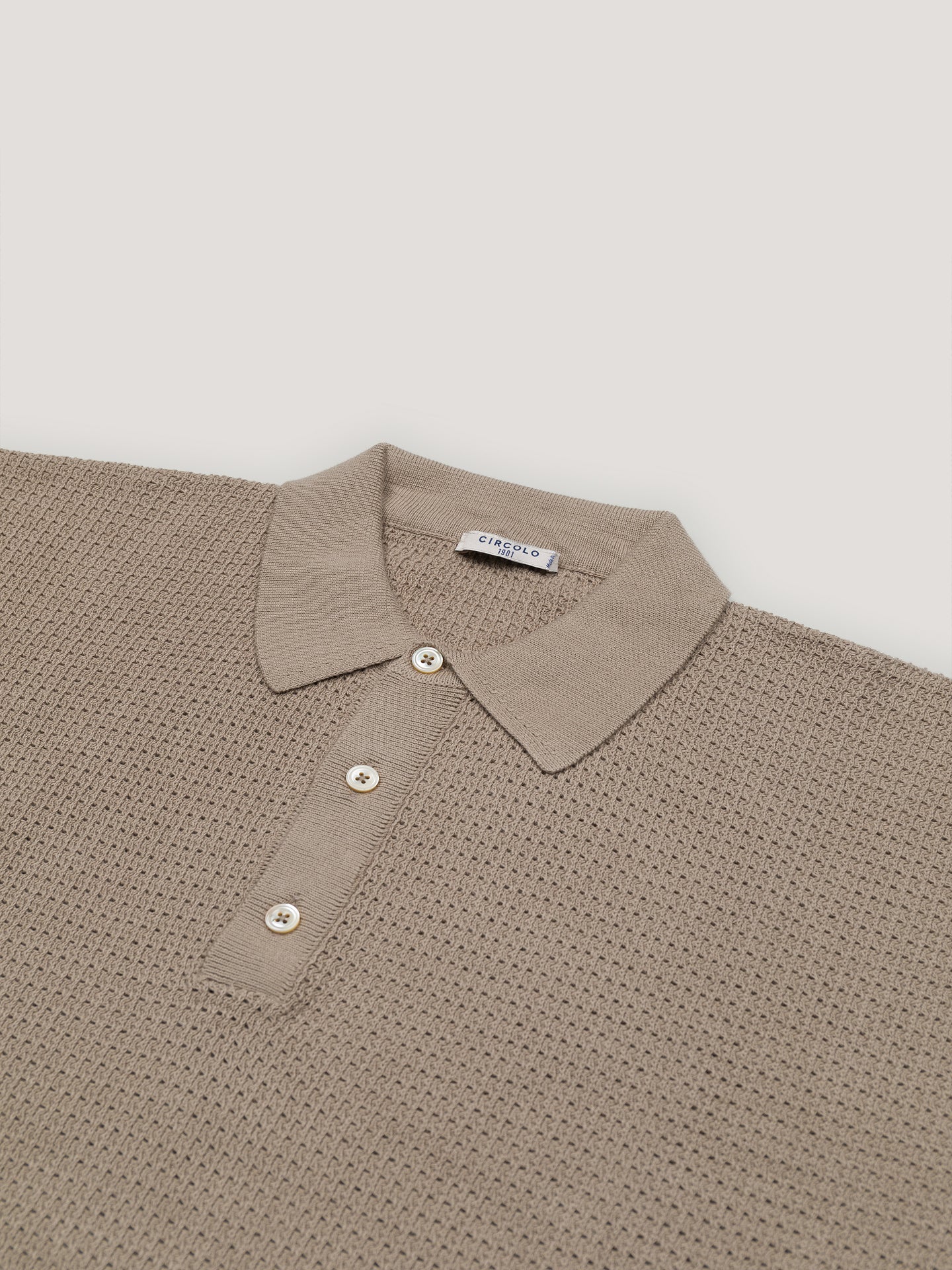 Eyelet pattern polo shirt