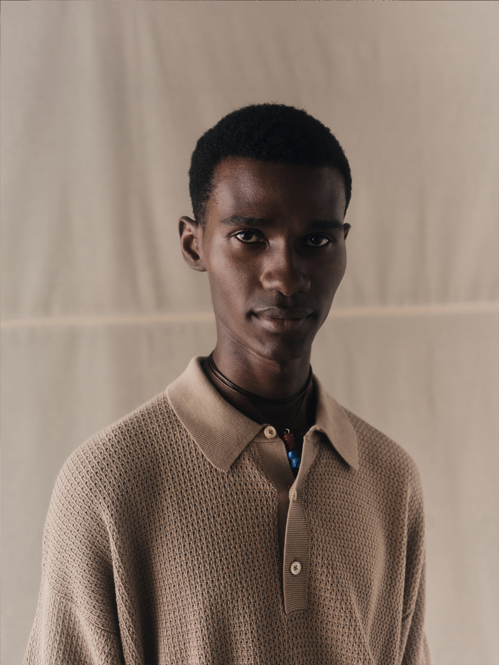 Eyelet pattern polo shirt