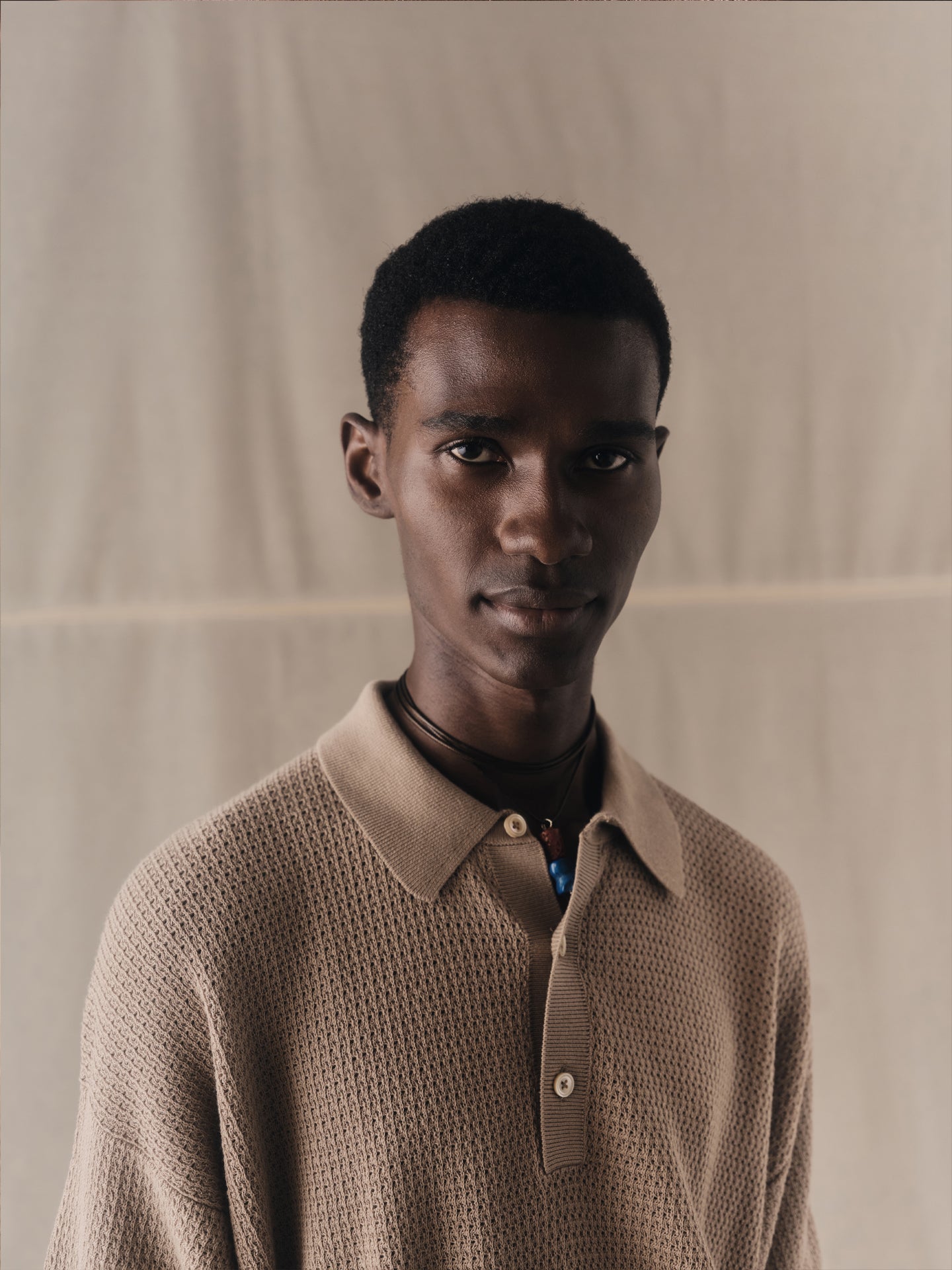 Eyelet pattern polo shirt